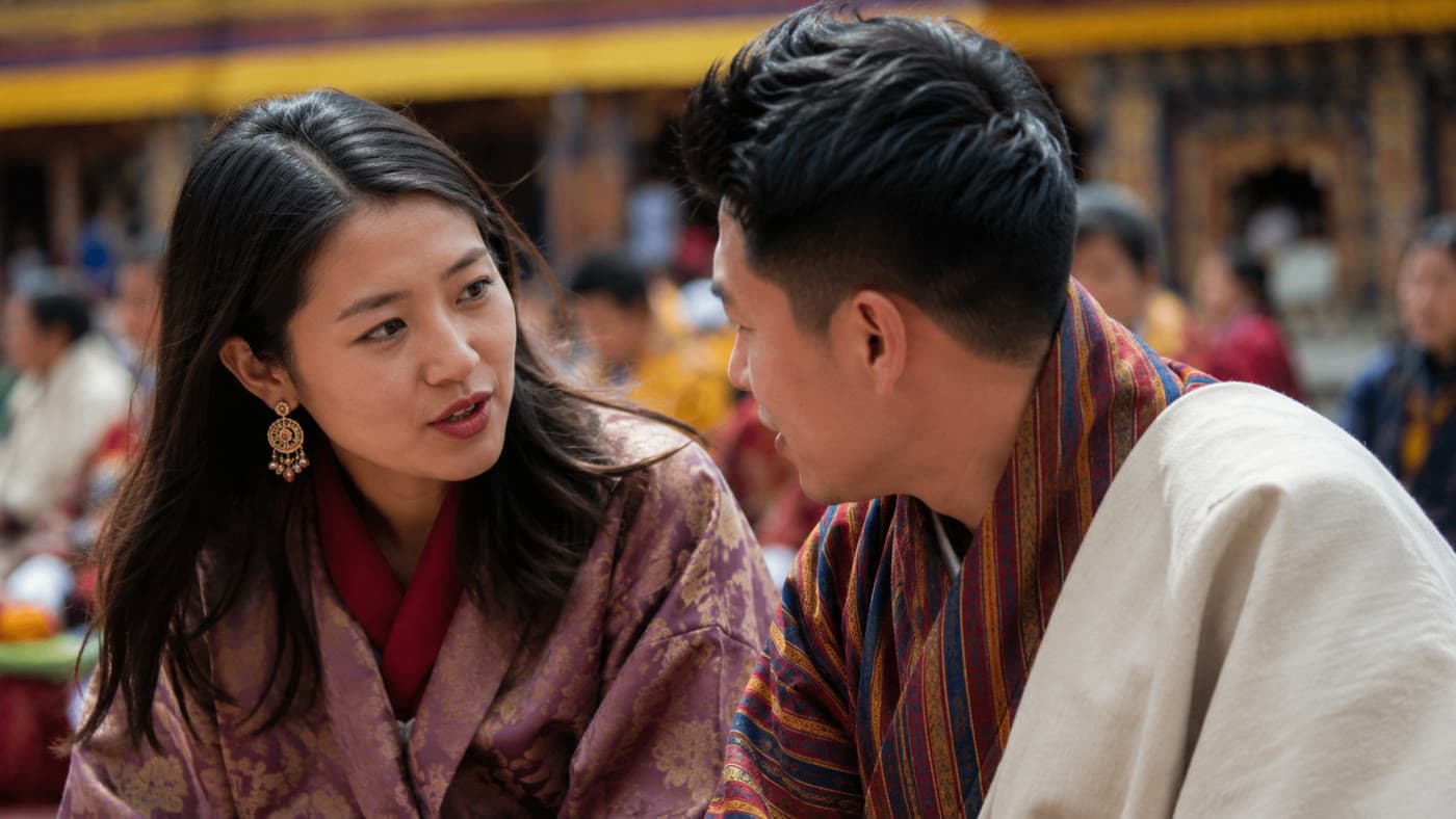 Two people continuing a conversation after the festival